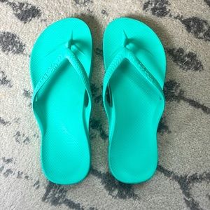 Archie’s flip flops